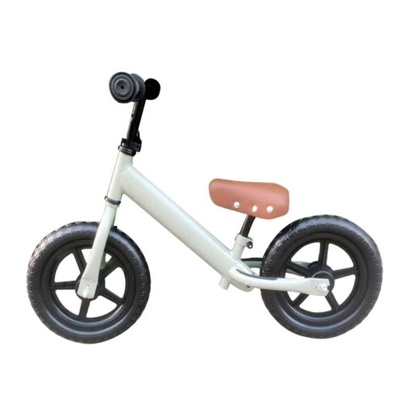 Toddler practicing outdoor riding techniques confidently